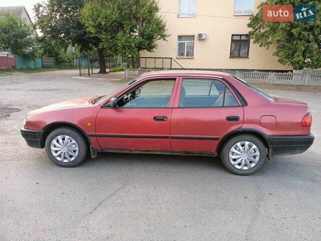 Червоний Тойота Королла, об'ємом двигуна 1.4 л та пробігом 270 тис. км за 1300 $, фото 14 на Automoto.ua