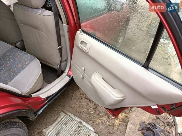 Червоний Тойота Королла, об'ємом двигуна 1.4 л та пробігом 270 тис. км за 1300 $, фото 26 на Automoto.ua