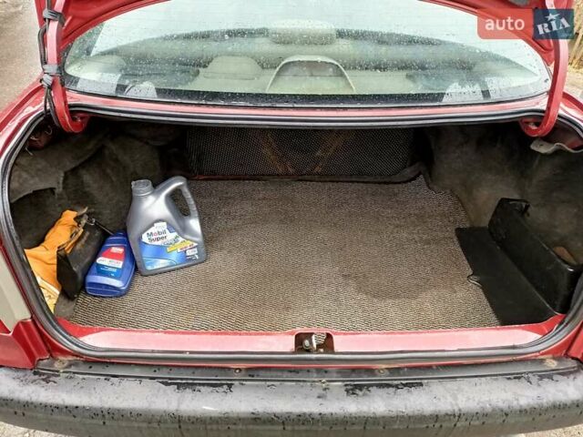 Червоний Тойота Королла, об'ємом двигуна 1.4 л та пробігом 270 тис. км за 1300 $, фото 33 на Automoto.ua