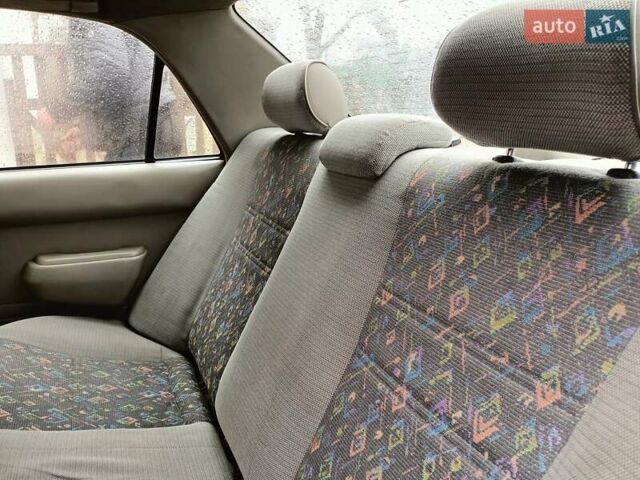 Червоний Тойота Королла, об'ємом двигуна 1.4 л та пробігом 270 тис. км за 1300 $, фото 30 на Automoto.ua