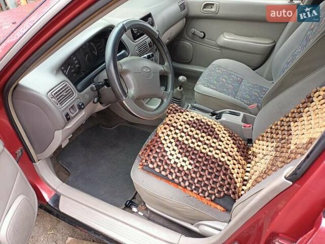 Червоний Тойота Королла, об'ємом двигуна 1.4 л та пробігом 270 тис. км за 1300 $, фото 16 на Automoto.ua