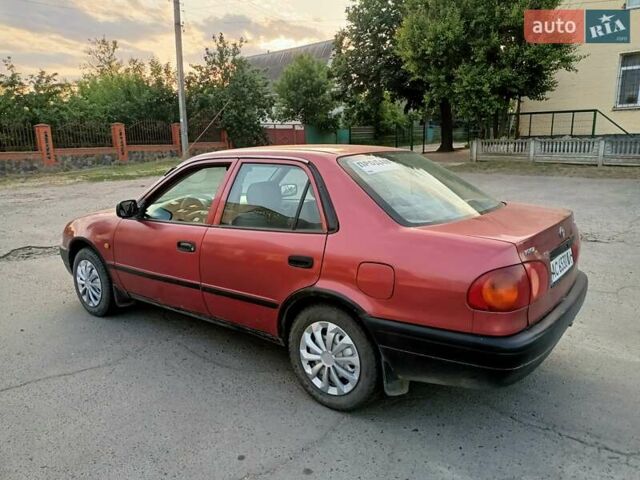 Червоний Тойота Королла, об'ємом двигуна 1.4 л та пробігом 270 тис. км за 1300 $, фото 12 на Automoto.ua