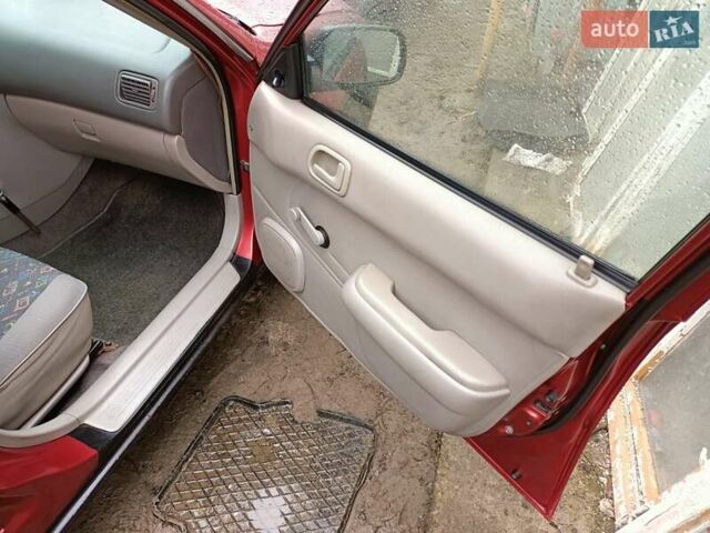 Червоний Тойота Королла, об'ємом двигуна 1.4 л та пробігом 270 тис. км за 1300 $, фото 24 на Automoto.ua