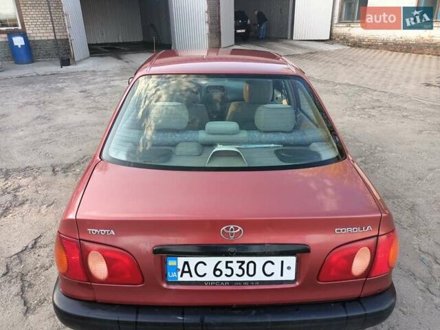 Червоний Тойота Королла, об'ємом двигуна 1.4 л та пробігом 270 тис. км за 1300 $, фото 5 на Automoto.ua