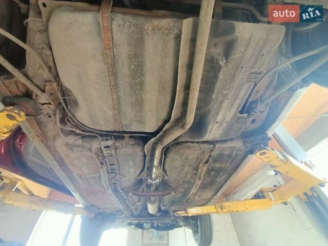 Червоний Тойота Королла, об'ємом двигуна 1.4 л та пробігом 270 тис. км за 1300 $, фото 8 на Automoto.ua