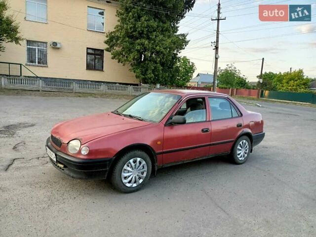 Червоний Тойота Королла, об'ємом двигуна 1.4 л та пробігом 270 тис. км за 1300 $, фото 15 на Automoto.ua