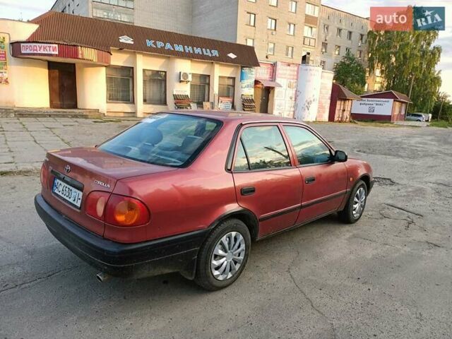 Червоний Тойота Королла, об'ємом двигуна 1.4 л та пробігом 270 тис. км за 1300 $, фото 11 на Automoto.ua