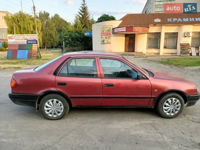 Червоний Тойота Королла, об'ємом двигуна 1.4 л та пробігом 270 тис. км за 1300 $, фото 13 на Automoto.ua