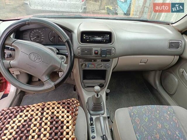 Червоний Тойота Королла, об'ємом двигуна 1.4 л та пробігом 270 тис. км за 1300 $, фото 29 на Automoto.ua