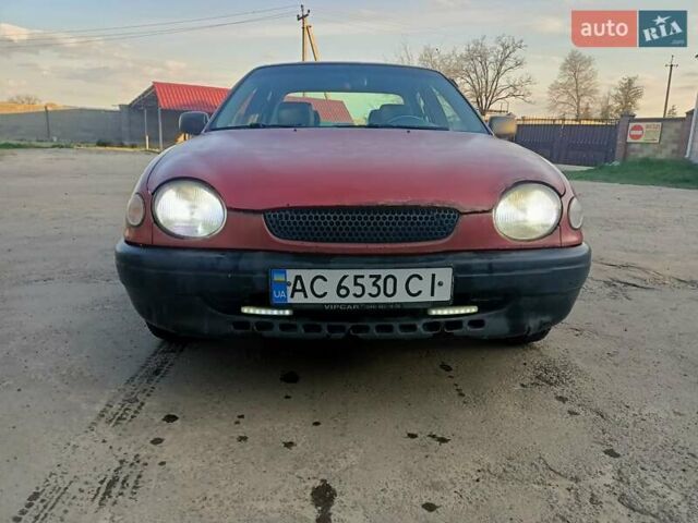 Червоний Тойота Королла, об'ємом двигуна 1.4 л та пробігом 270 тис. км за 1300 $, фото 3 на Automoto.ua