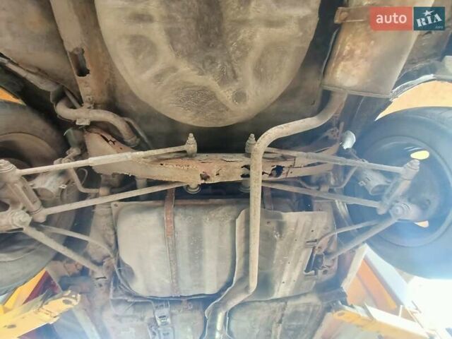 Червоний Тойота Королла, об'ємом двигуна 1.4 л та пробігом 270 тис. км за 1300 $, фото 9 на Automoto.ua