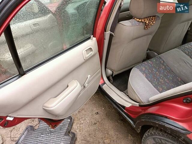 Червоний Тойота Королла, об'ємом двигуна 1.4 л та пробігом 270 тис. км за 1300 $, фото 28 на Automoto.ua