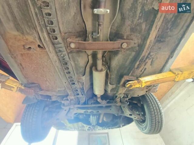 Червоний Тойота Королла, об'ємом двигуна 1.4 л та пробігом 270 тис. км за 1300 $, фото 6 на Automoto.ua