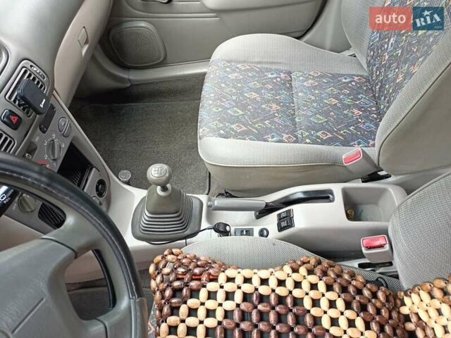 Червоний Тойота Королла, об'ємом двигуна 1.4 л та пробігом 270 тис. км за 1300 $, фото 17 на Automoto.ua