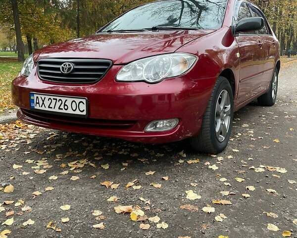 Червоний Тойота Королла, об'ємом двигуна 1.79 л та пробігом 250 тис. км за 5100 $, фото 1 на Automoto.ua