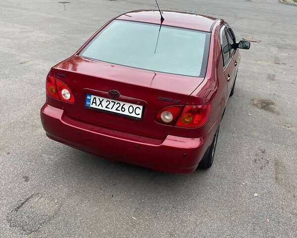 Червоний Тойота Королла, об'ємом двигуна 1.79 л та пробігом 250 тис. км за 5100 $, фото 5 на Automoto.ua