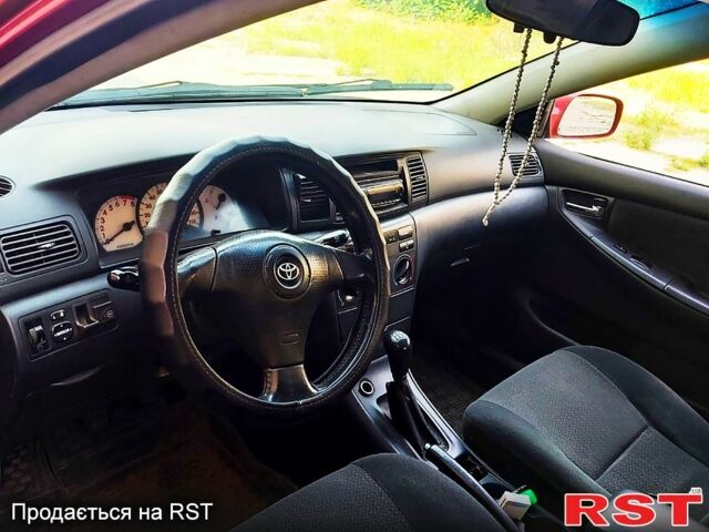 Красный Тойота Королла, объемом двигателя 1.8 л и пробегом 145 тыс. км за 3950 $, фото 4 на Automoto.ua