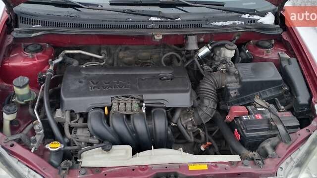 Красный Тойота Королла, объемом двигателя 1.8 л и пробегом 213 тыс. км за 4500 $, фото 2 на Automoto.ua