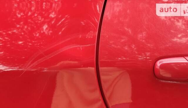 Червоний Тойота Королла, об'ємом двигуна 1.6 л та пробігом 147 тис. км за 9100 $, фото 12 на Automoto.ua