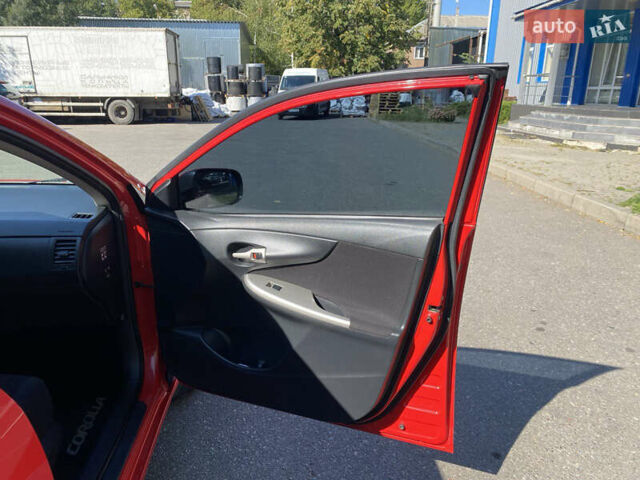 Красный Тойота Королла, объемом двигателя 1.6 л и пробегом 116 тыс. км за 9425 $, фото 20 на Automoto.ua