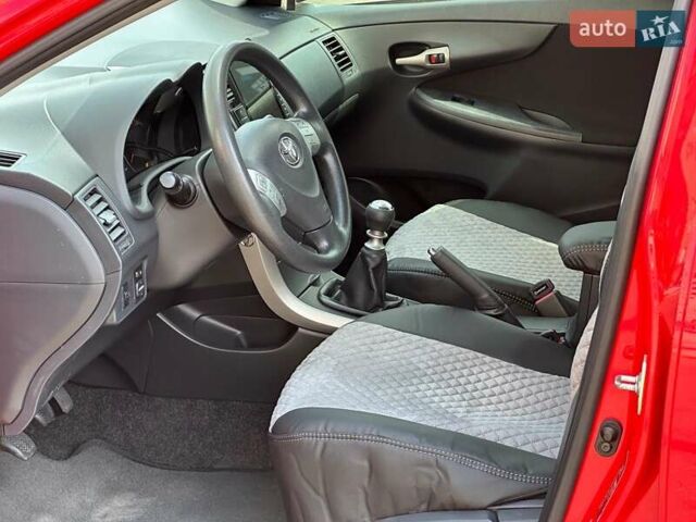 Червоний Тойота Королла, об'ємом двигуна 1.3 л та пробігом 162 тис. км за 7490 $, фото 9 на Automoto.ua