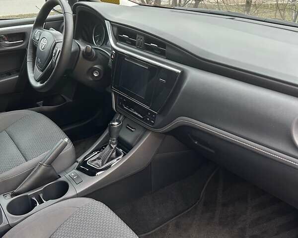 Красный Тойота Королла, объемом двигателя 1.6 л и пробегом 76 тыс. км за 15400 $, фото 10 на Automoto.ua