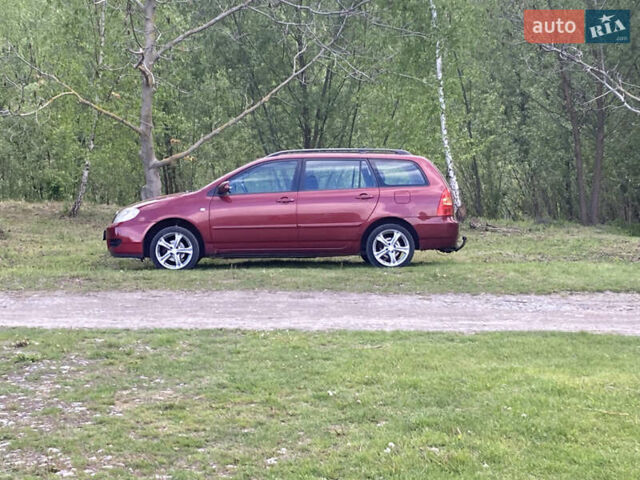 Червоний Тойота Королла, об'ємом двигуна 1.39 л та пробігом 218 тис. км за 5600 $, фото 5 на Automoto.ua