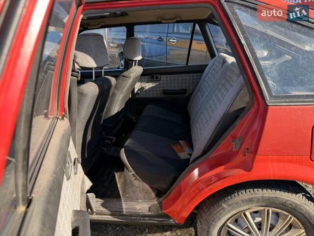 Красный Тойота Королла, объемом двигателя 1.3 л и пробегом 100 тыс. км за 500 $, фото 6 на Automoto.ua