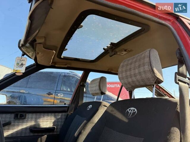Красный Тойота Королла, объемом двигателя 1.3 л и пробегом 100 тыс. км за 500 $, фото 5 на Automoto.ua