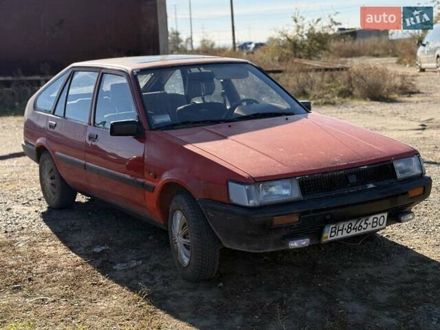 Красный Тойота Королла, объемом двигателя 1.3 л и пробегом 100 тыс. км за 500 $, фото 4 на Automoto.ua