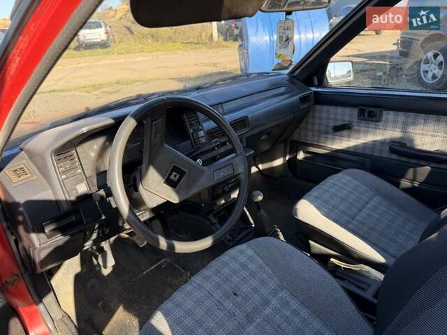 Красный Тойота Королла, объемом двигателя 1.3 л и пробегом 100 тыс. км за 500 $, фото 1 на Automoto.ua