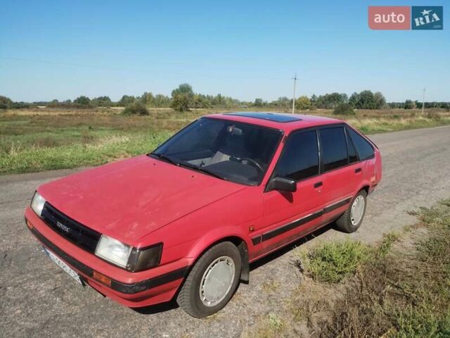 Красный Тойота Королла, объемом двигателя 1.8 л и пробегом 253 тыс. км за 700 $, фото 1 на Automoto.ua