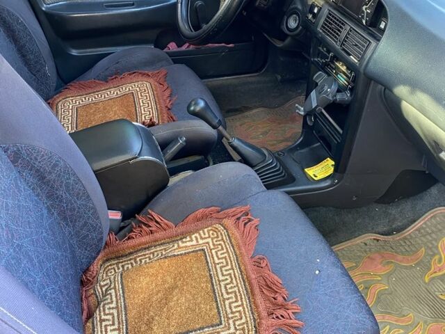 Красный Тойота Королла, объемом двигателя 1.3 л и пробегом 200 тыс. км за 1300 $, фото 8 на Automoto.ua