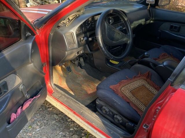 Красный Тойота Королла, объемом двигателя 1.3 л и пробегом 200 тыс. км за 1300 $, фото 9 на Automoto.ua