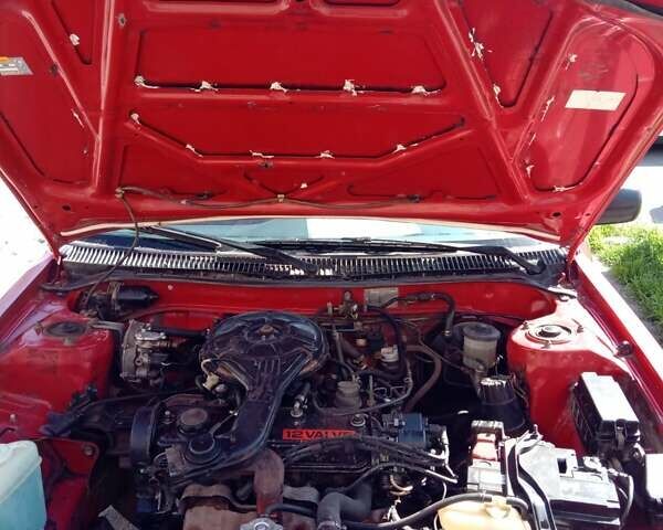 Красный Тойота Королла, объемом двигателя 1.28 л и пробегом 453 тыс. км за 1444 $, фото 6 на Automoto.ua