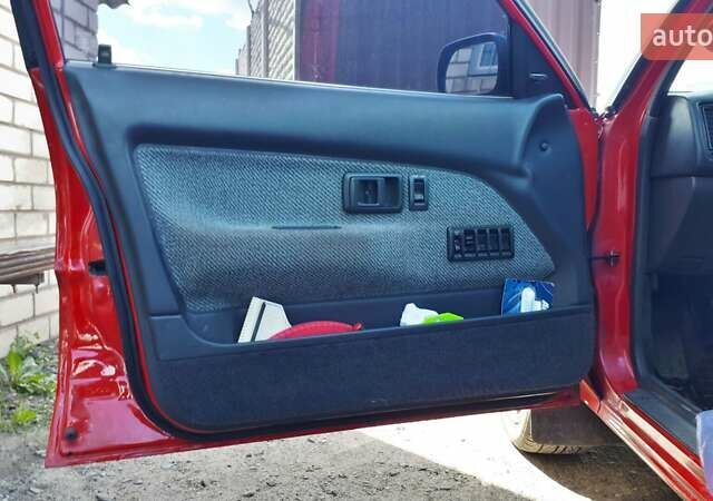 Червоний Тойота Королла, об'ємом двигуна 1.3 л та пробігом 374 тис. км за 2350 $, фото 12 на Automoto.ua