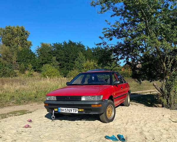 Красный Тойота Королла, объемом двигателя 1.3 л и пробегом 229 тыс. км за 2350 $, фото 13 на Automoto.ua