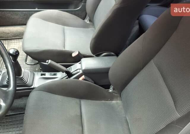 Червоний Тойота Королла, об'ємом двигуна 1.3 л та пробігом 374 тис. км за 2350 $, фото 15 на Automoto.ua