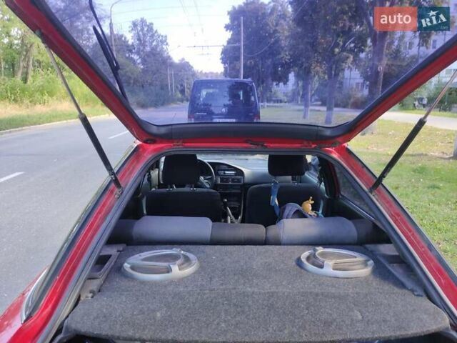 Червоний Тойота Королла, об'ємом двигуна 1.3 л та пробігом 374 тис. км за 2350 $, фото 7 на Automoto.ua