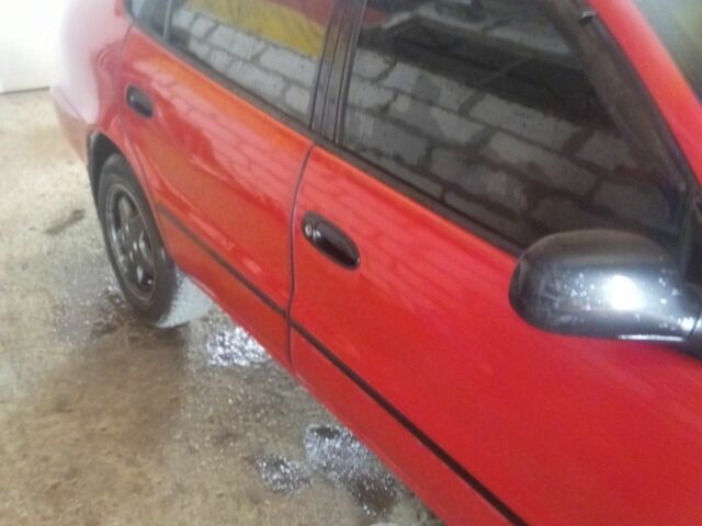 Красный Тойота Королла, объемом двигателя 1.4 л и пробегом 423 тыс. км за 2299 $, фото 3 на Automoto.ua