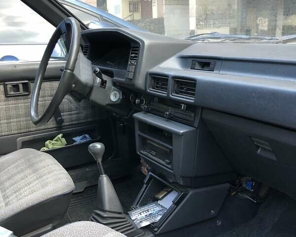 Серый Тойота Королла, объемом двигателя 1.3 л и пробегом 275 тыс. км за 1200 $, фото 7 на Automoto.ua