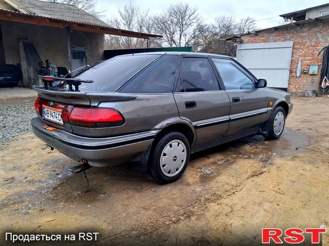 Сірий Тойота Королла, об'ємом двигуна 1.3 л та пробігом 236 тис. км за 900 $, фото 1 на Automoto.ua