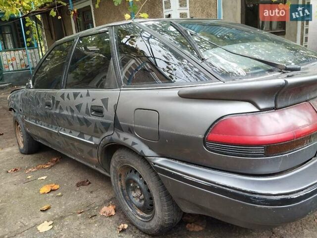 Серый Тойота Королла, объемом двигателя 1.6 л и пробегом 400 тыс. км за 800 $, фото 1 на Automoto.ua