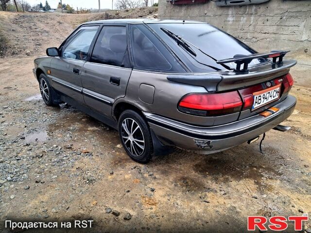 Сірий Тойота Королла, об'ємом двигуна 1.3 л та пробігом 236 тис. км за 900 $, фото 3 на Automoto.ua