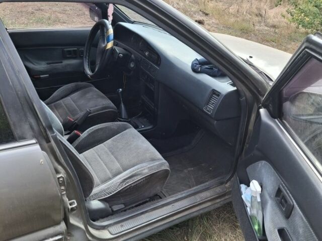 Серый Тойота Королла, объемом двигателя 1.6 л и пробегом 500 тыс. км за 1200 $, фото 2 на Automoto.ua