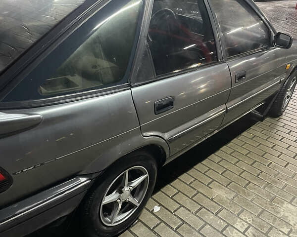 Серый Тойота Королла, объемом двигателя 1.84 л и пробегом 328 тыс. км за 1800 $, фото 9 на Automoto.ua