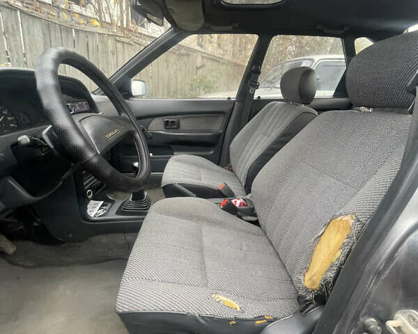 Серый Тойота Королла, объемом двигателя 1.84 л и пробегом 328 тыс. км за 1800 $, фото 11 на Automoto.ua