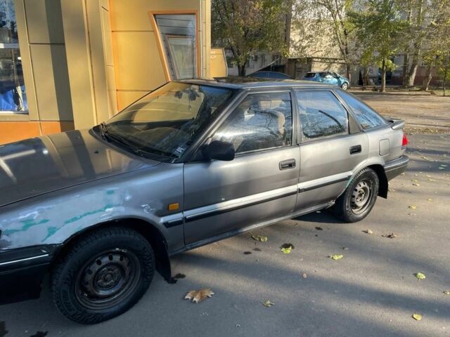 Сірий Тойота Королла, об'ємом двигуна 1.3 л та пробігом 346 тис. км за 1000 $, фото 1 на Automoto.ua