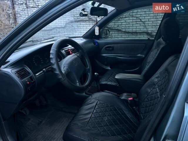 Серый Тойота Королла, объемом двигателя 1.33 л и пробегом 308 тыс. км за 1900 $, фото 10 на Automoto.ua