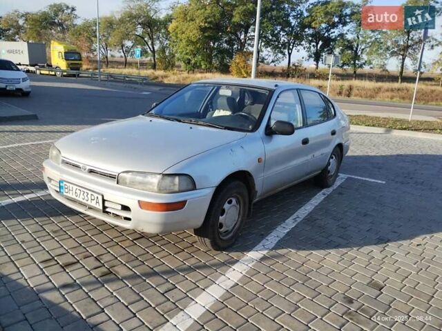 Серый Тойота Королла, объемом двигателя 1.33 л и пробегом 398 тыс. км за 1999 $, фото 1 на Automoto.ua